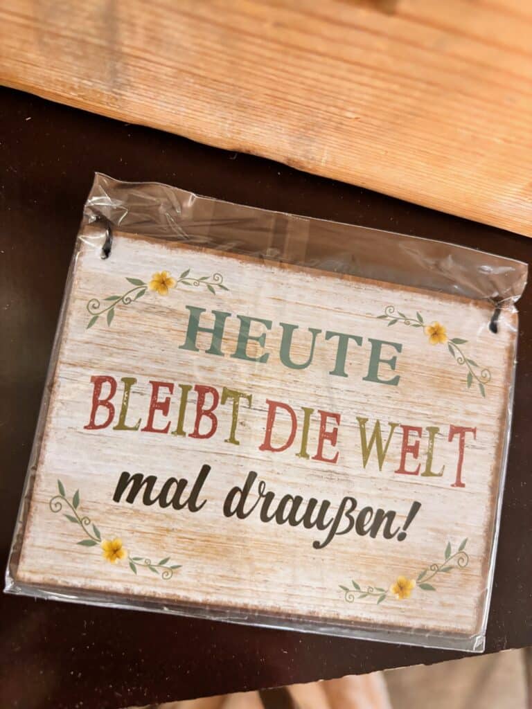 Schild mit Spruch